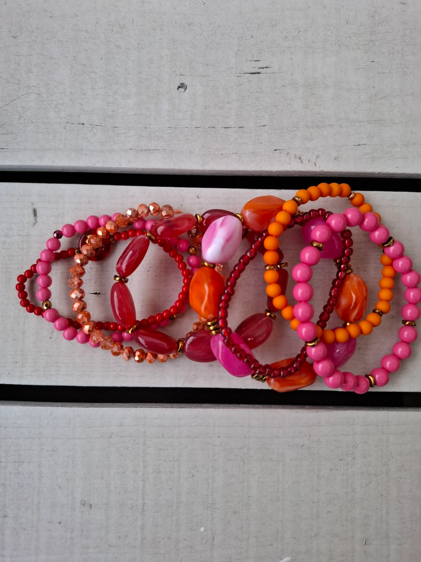 Conjunto de pulseras en rojo/rosa/naranja – photo 2